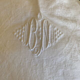 White cotton and linen tablecloth with central monogram from the 1960s.