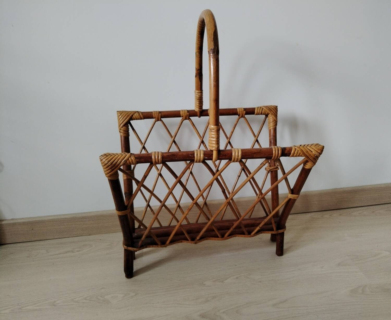 Rattan magazine rack from the 1950s