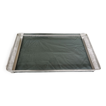 Vintage plateau in smoked glass and chrome metal.