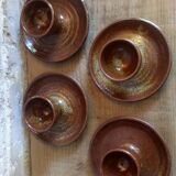 Four pyrite stoneware shells