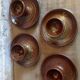 Four pyrite stoneware shells