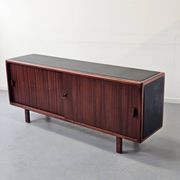 Vintage enfilade in teak and leather, 1970s.