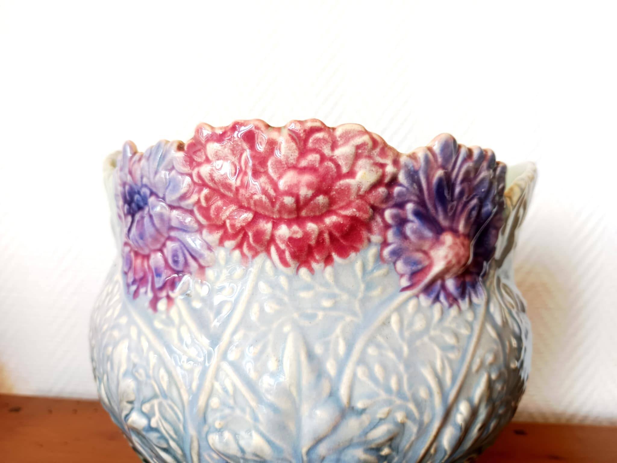 Art Nouveau flowerpot with slip peonies