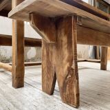 Oak farmhouse table and its two benches