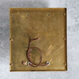 Wall sconce in brass and glass