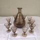 Liqueur glass Brown and gold edging and 9 small glasses Decanter's vintage liquor