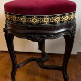 Old piano stool
