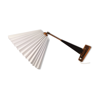 Wall lamp with adjustable ‘arm’ in copper and rosewood, with white shade.