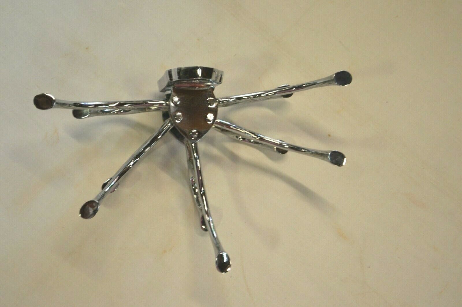 Porte manteau circulaire en métal chromé