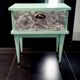 Vintage bedside table with compass feet