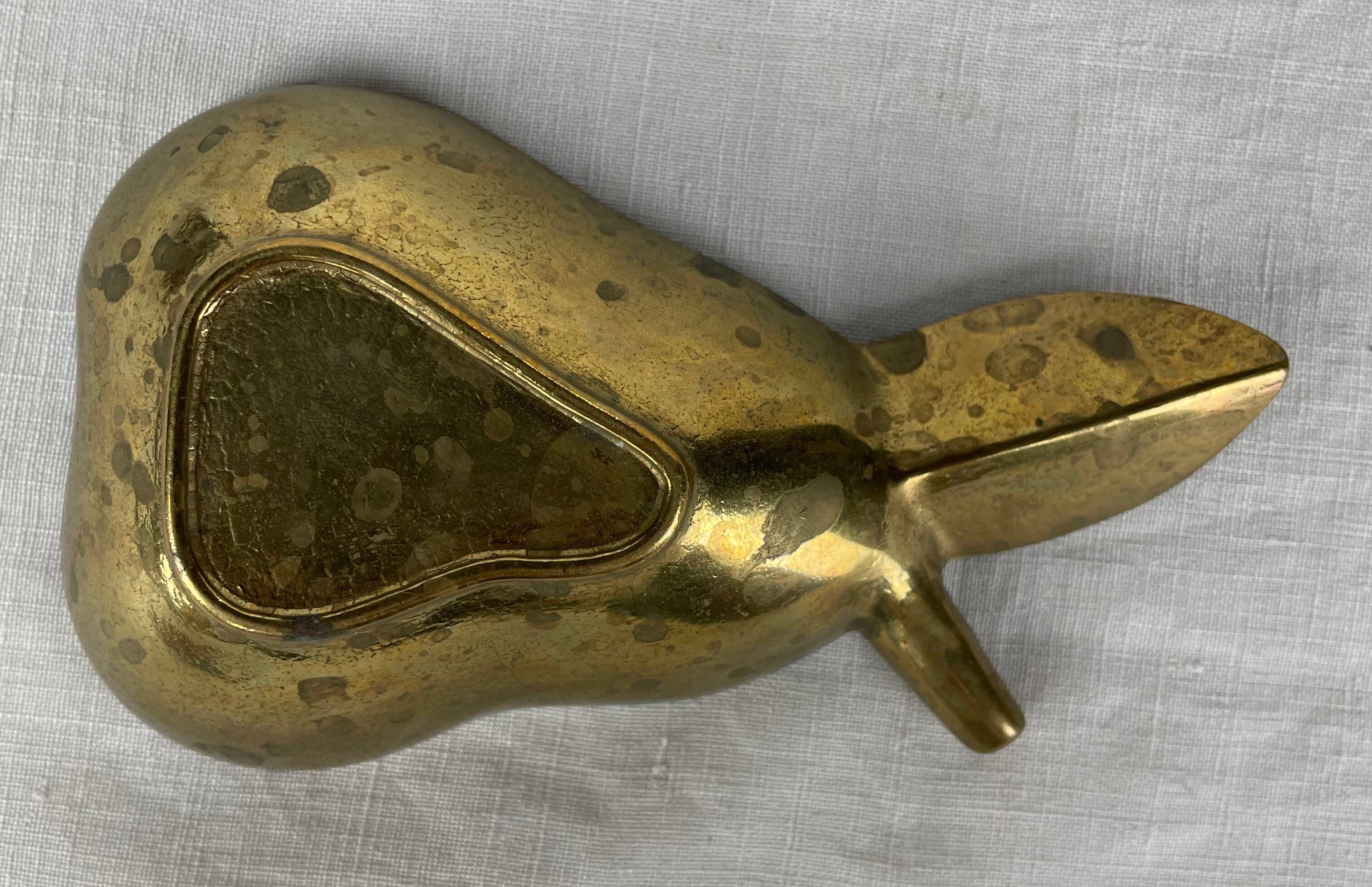 Empty pocket ashtray in pear-shaped brass