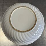 Large earthenware centerpiece dish with painted decoration of a drummer