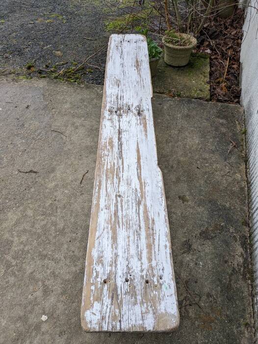 Old bench limed in white