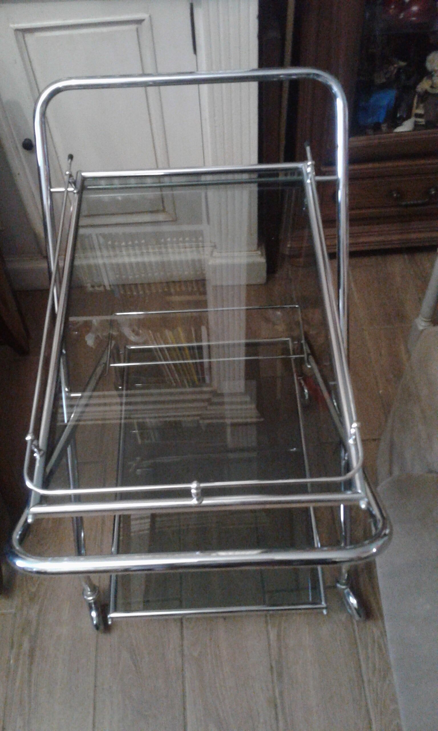 Chrome and smoked glass serving in the year 70