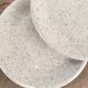 Set of 8 speckled plates