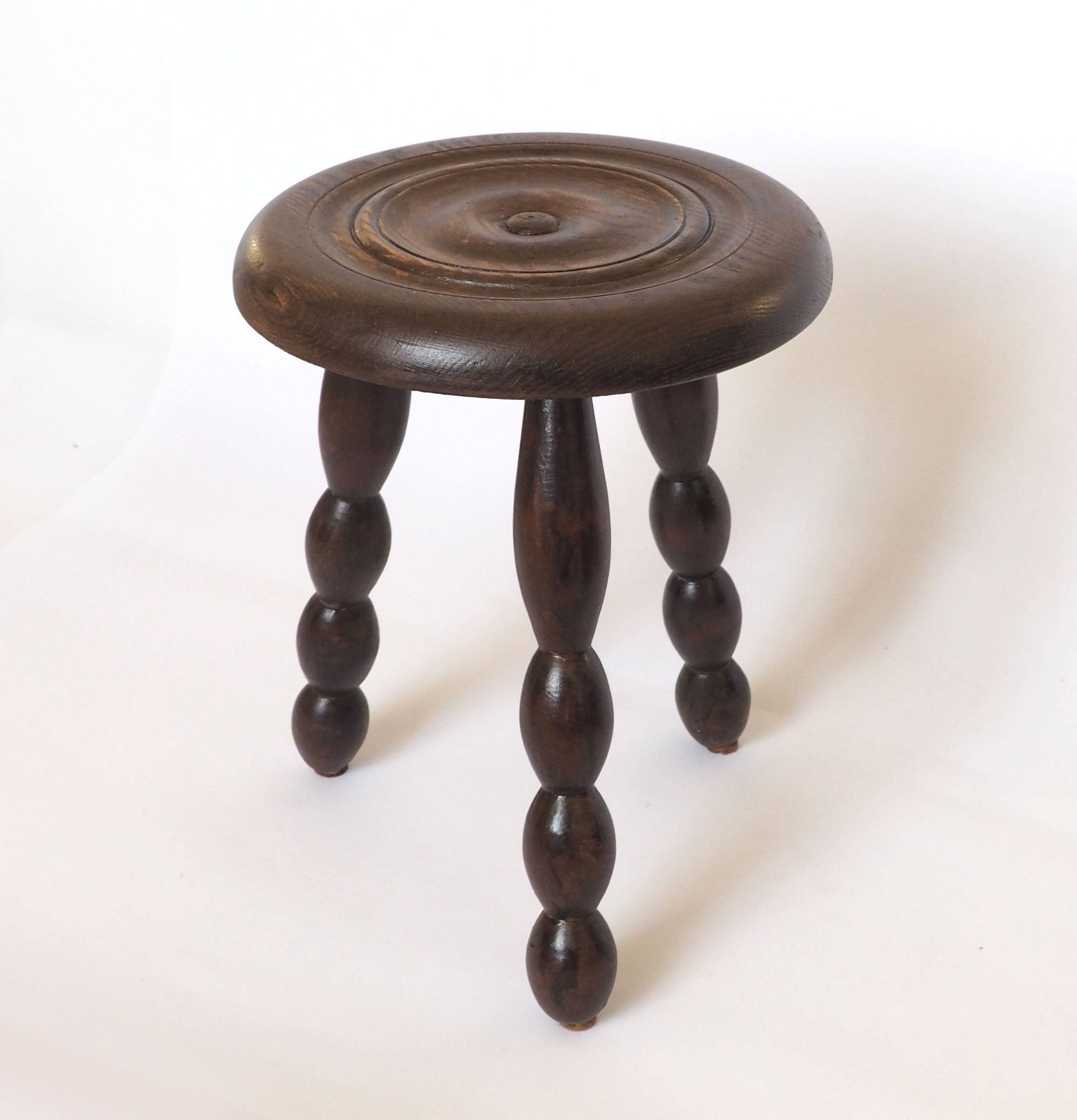 Beaded wooden tripod stool