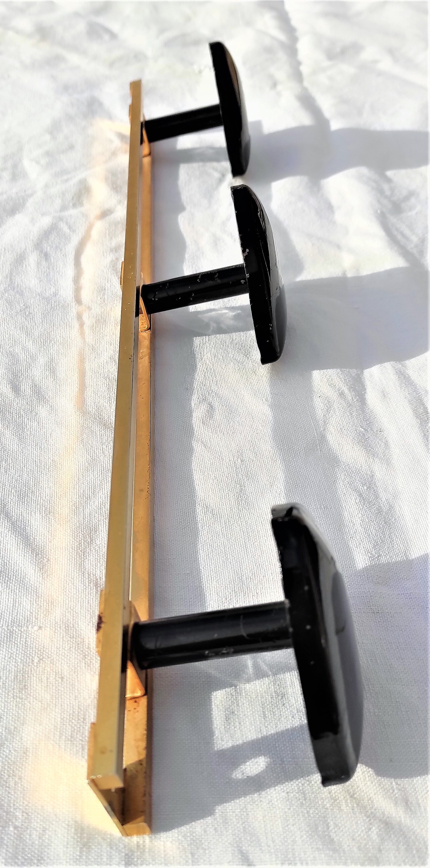 COAT RACK in gold metal and 3 black triangular PATERES circa 1960 Vintage