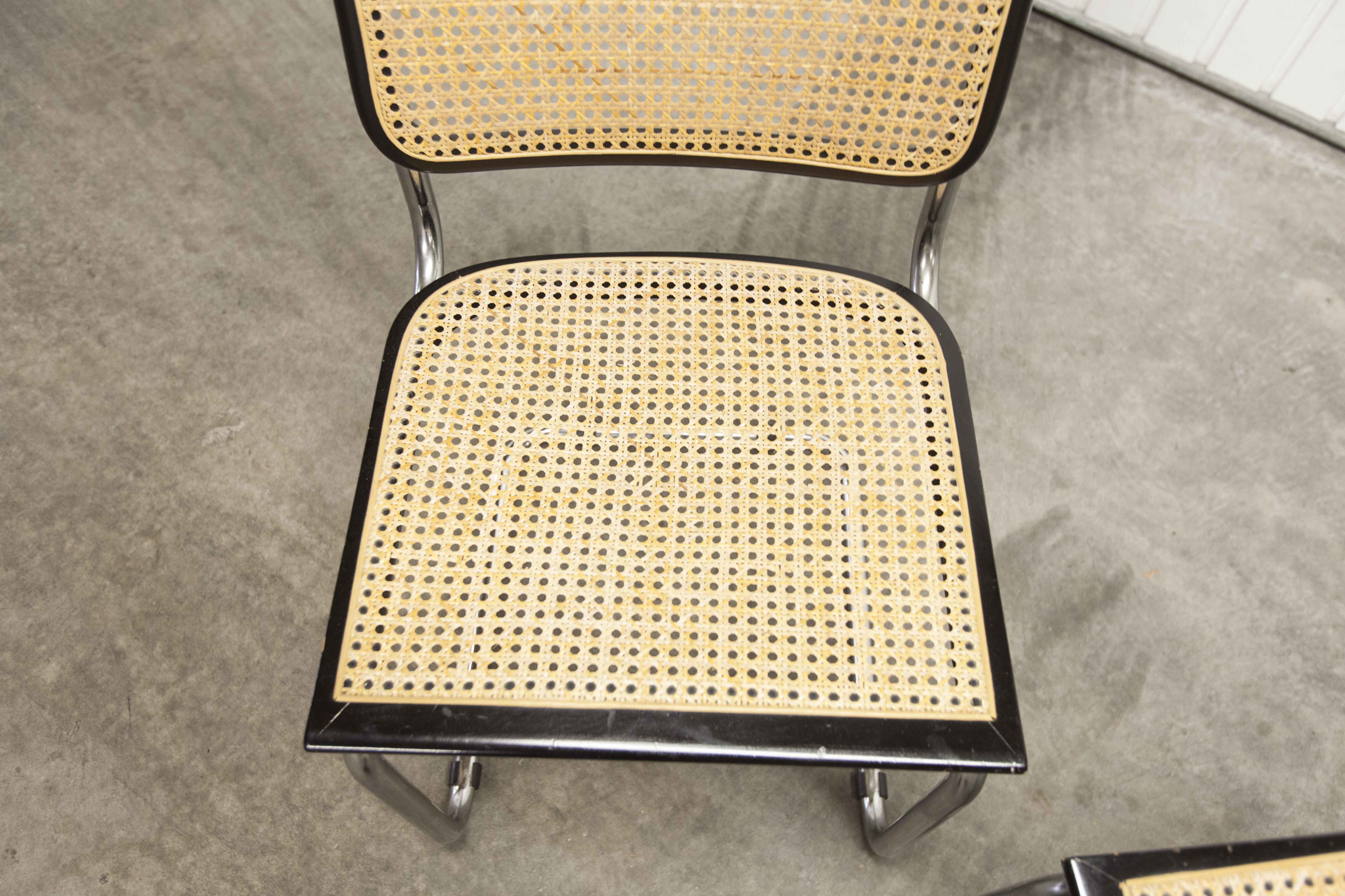 Pair of black Breuer b32 chairs and cannage