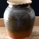 Old glazed terracotta pot