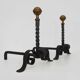 Large pair of wrought iron and brass ball fireplace andirons. 19th century