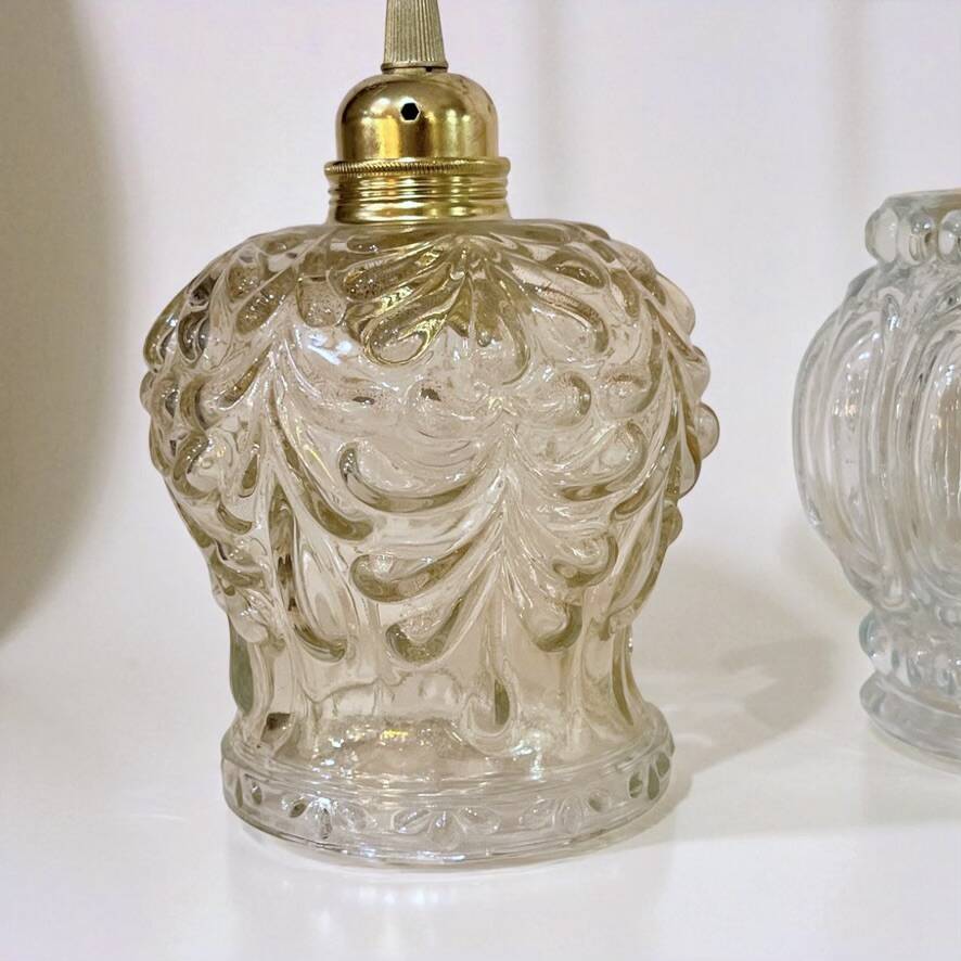 Cascade pendant light with 3 molded glass globes in vintage arabesque amber glass