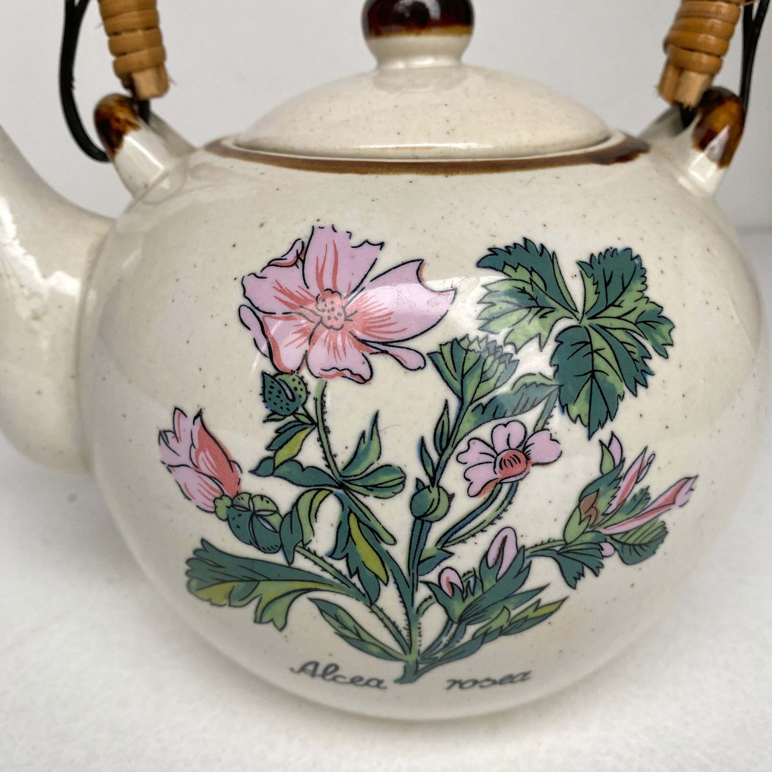 Vintage rattan teapot