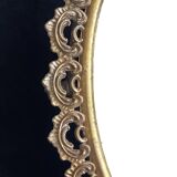 Swivel table mirror in golden metal