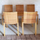 5 wooden and rattan chairs