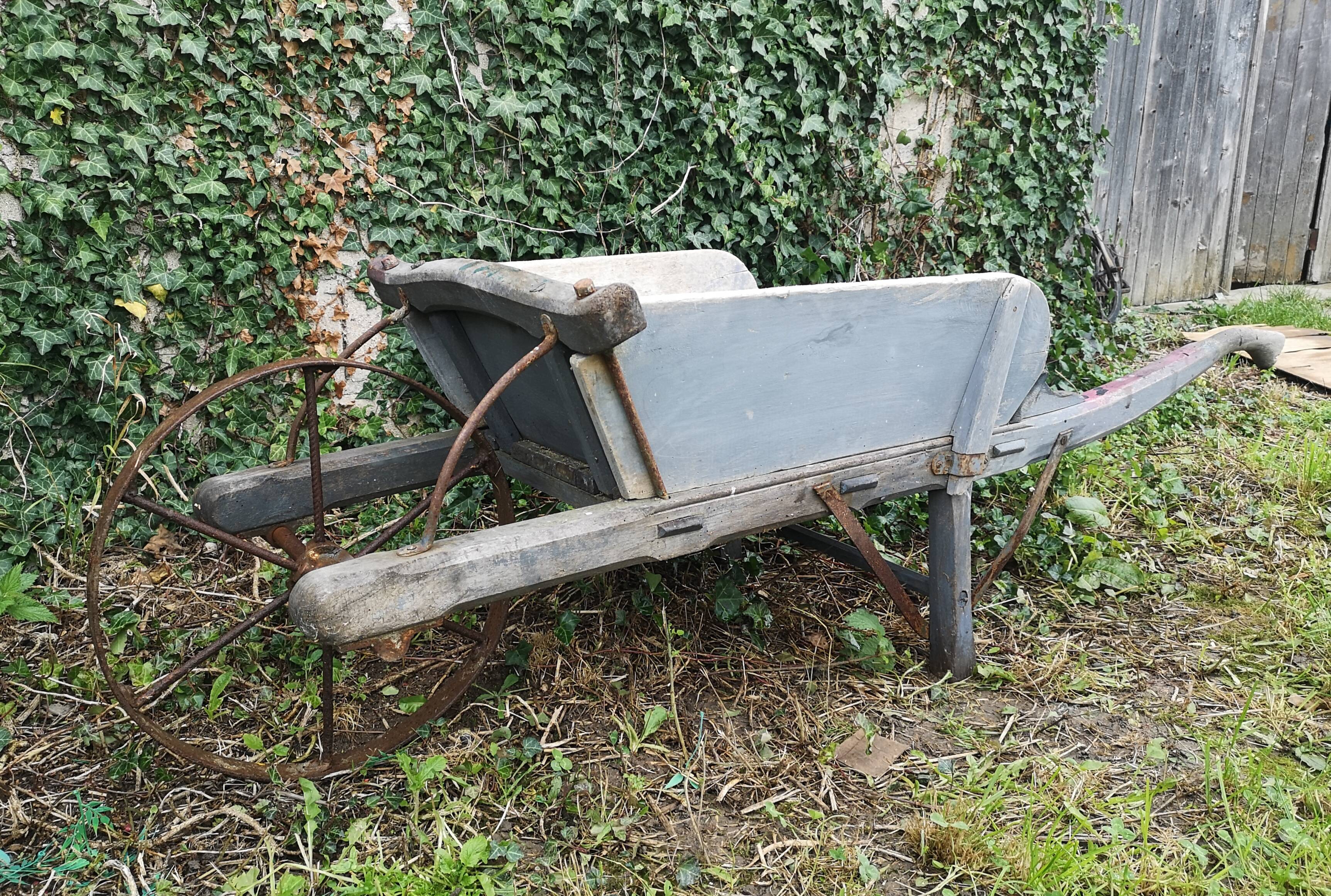Wheelbarrow old folk art