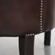 dark cowhide club chair in English style