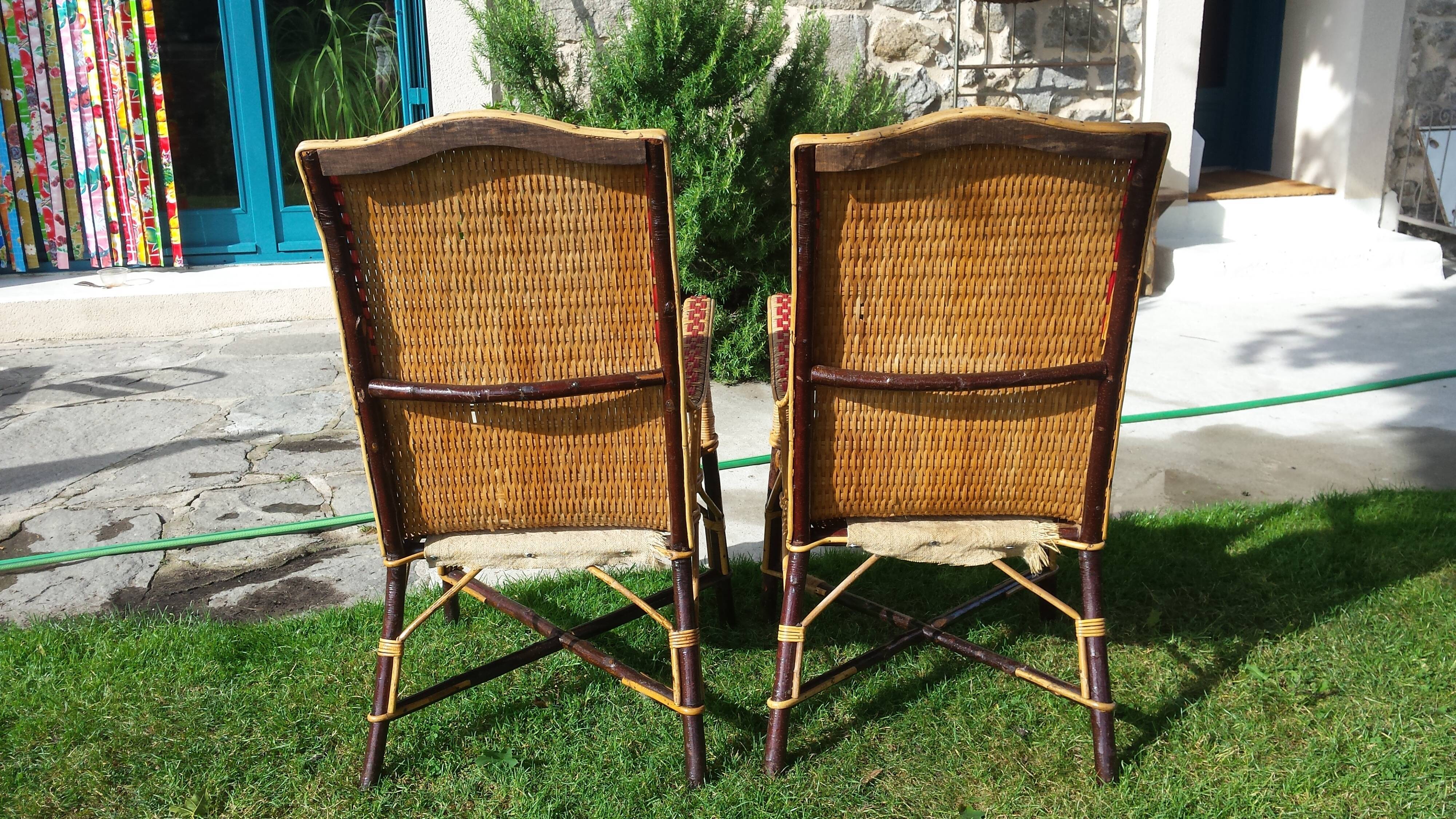 Wicker or rattan armchairs and bamboo