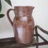 Vintage pitcher in glazed sandstone