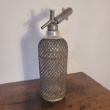 Old glass and metal siphon