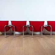 Pair of Italian armchairs in chromed metal and red fabric, 1970