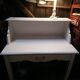 White lacquered desk.