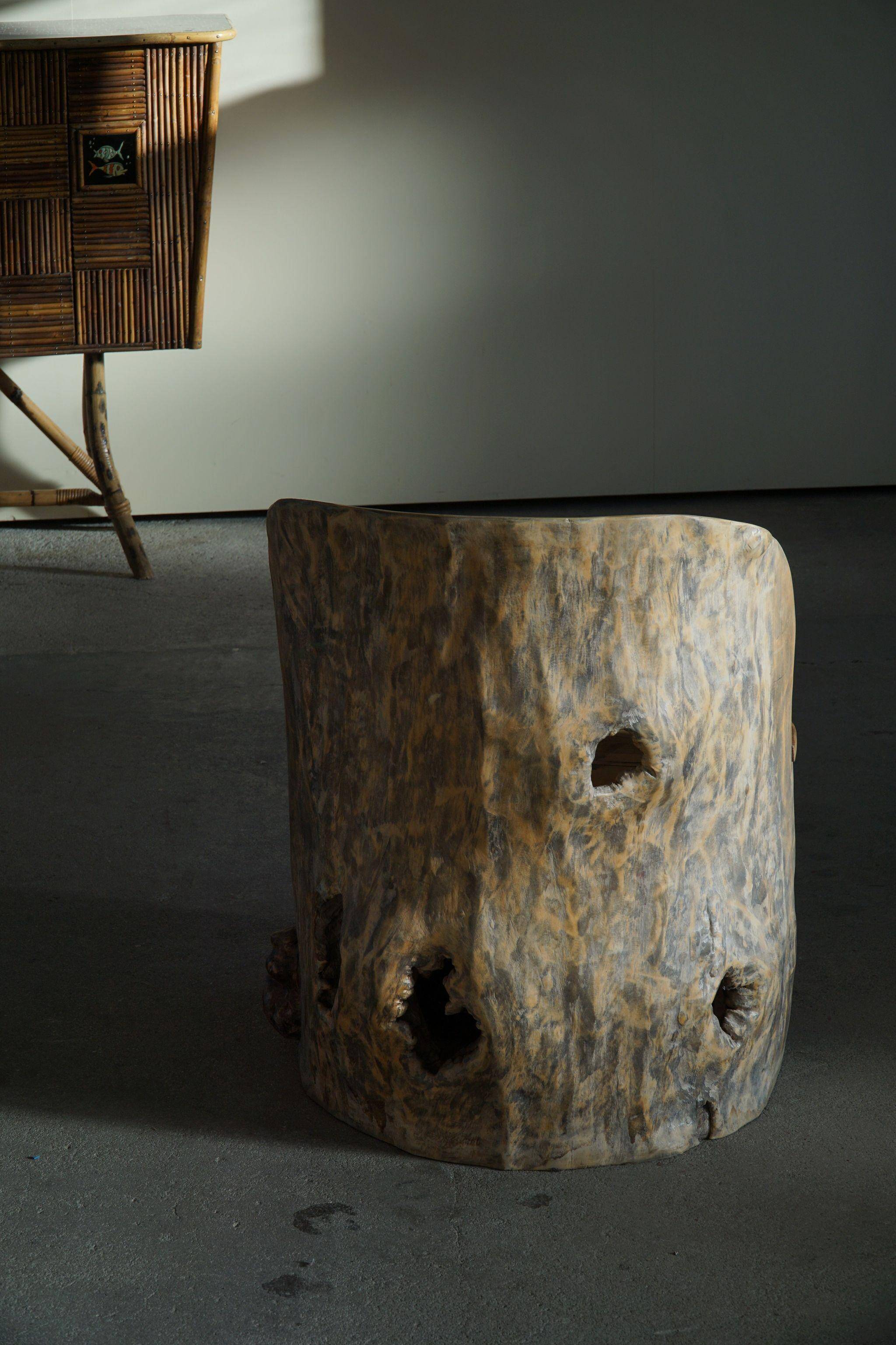 Sculptural Norwegian trunk chair in mid-century brutalist solid wood.