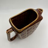 Ceramic pitcher with braided effect