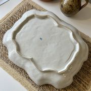 Large decorative antique plate with raised flowers – 19th century style