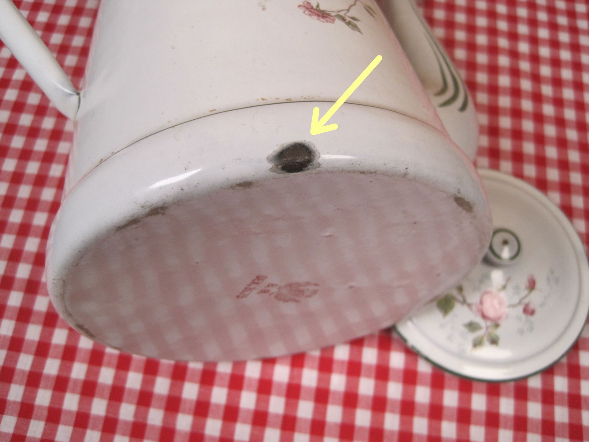Old coffee maker in enamelled sheet metal brand bb 1900s , decoration of roses , kitchen utensils