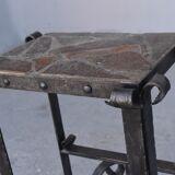 Pair of wrought iron and lava stone bedsides