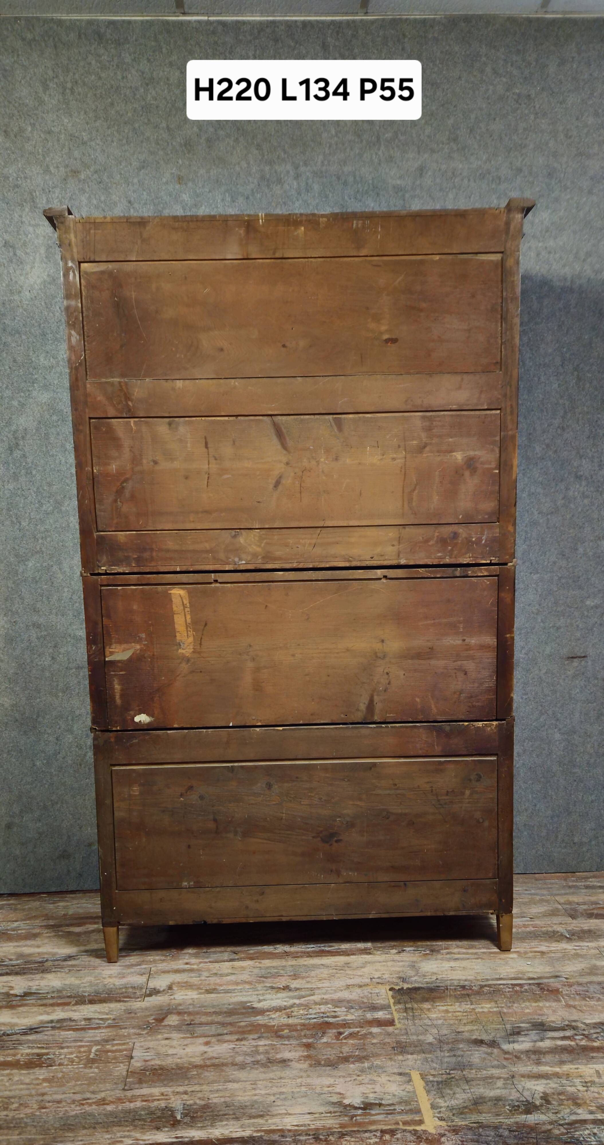 Secretary with three bodies in walnut from the Louis XVI period.
