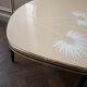 Tripod coffee table with floral design from the 1950s in brass metal and decorative top.