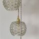 Suspension cascade trois feux globes vintage en verre moulé