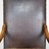 Louis XIII office armchair in leather and walnut carved around 1860