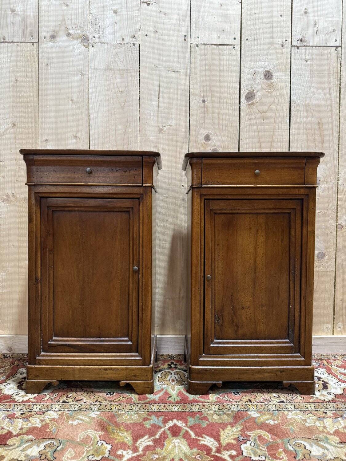 Pair of Louis Philippe style bedside tables in walnut