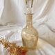 Carafe jaune en verre ciselé