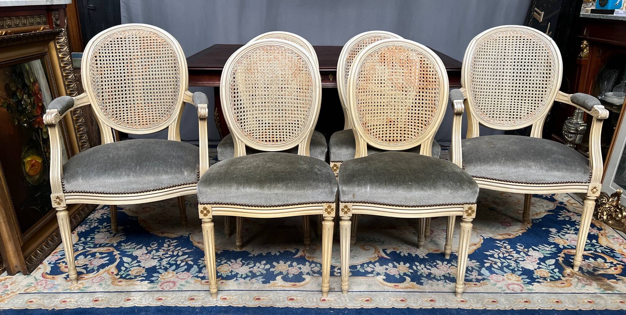 Set of four Louis XVI style chairs and two armchairs.