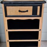 Raw oak and matte black storage cabinet on stencil top and transfer