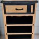 Raw oak and matte black storage cabinet on stencil top and transfer