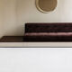 Red Edition Stanley 3-seater sofa with matching chocolate velvet storage.